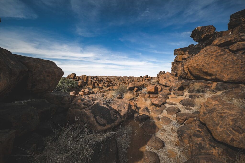 Rocky desert hiking trail in Arizona with natural snake habitat terrain