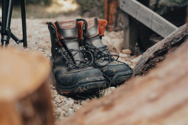 Hiker wearing protective hiking boots in Arizona desert trail